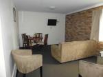 Deluxe Family Suites have a separate lounge and dining area with kitchenette