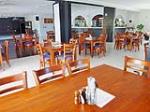 Indoor dining area - Yasi Bar + Grill at Cardwell @ the Beach
