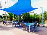 Poolside dining area - Yasi Bar + Grill at Cardwell @ the Beach