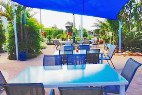 Yasi Bar + Grill features a poolside dining area with children’s playground - Cardwell @ the Beach Cardwell QLD